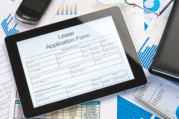 iPad with Online Lease Application Form Displayed