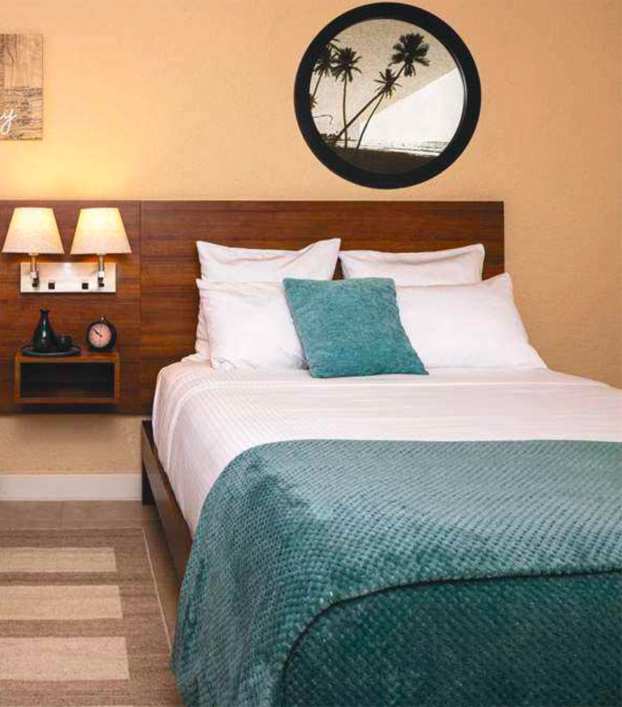 Sage accents highlight the Wyndham Hotel Las Palmas Double guest room.